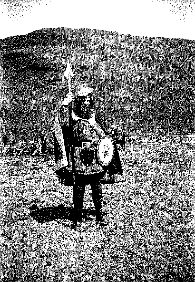 placeholder for Kristian Bjornard... A man in Viking costume holds a spear and round shield on the rocky plain at Þingvellir, Iceland, with Ármannsfell in the background. Photograph by Berit Wallenberg, 1930.