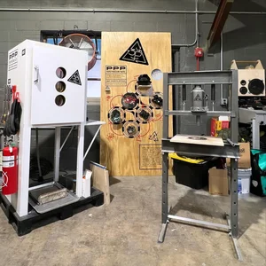 The full 3P setup: the processing cabinet, a plywood signage board, and the press machine together