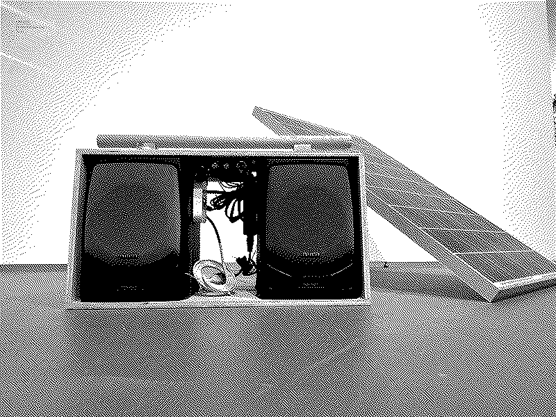 Solarpunk Boombox: two salvaged speakers in a plywood case, angled toward its solar panel